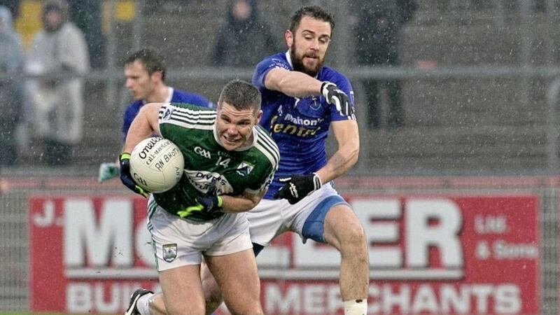 Kevin Cassidy of Gaoth Dobhair gets away from Scotstown's Emmet Caulfield during the Ulster Club Senior Football final. Picture by Philip Walsh