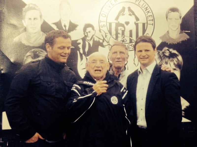 Jackie Maxwell pictured with former Plunkett players Jim Magilton and Phillip Mulryne, and Sean Rogan - Anton's father