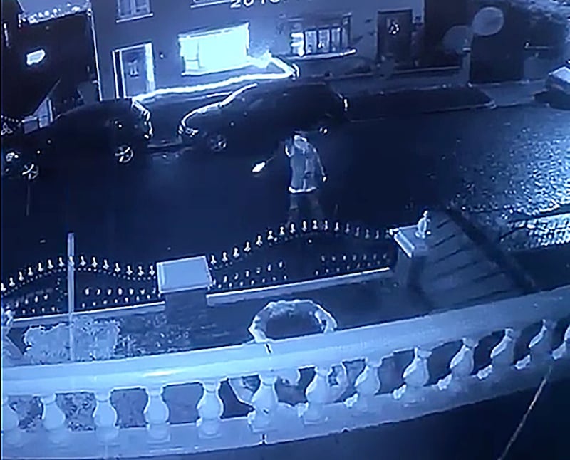 &nbsp;Footage shows man dressed as Santa firing into the property