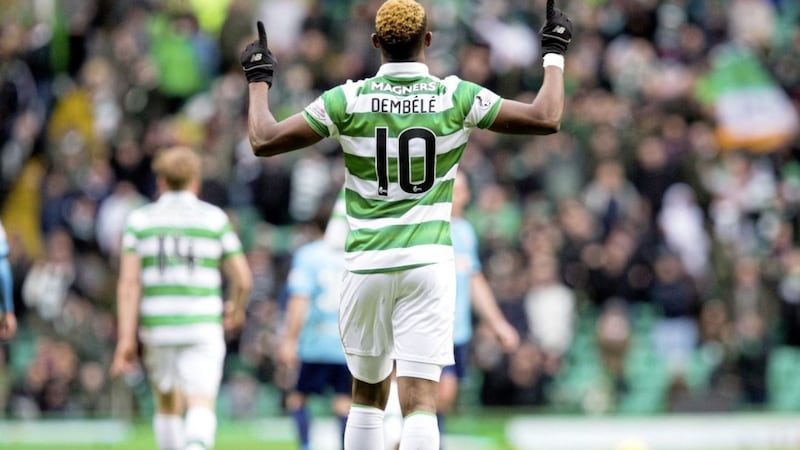 Celtic striker Moussa Dembele celebrates scoring his side&#39;s second goal in their 2-0 win over Hamilton on Saturday Picture: PA 