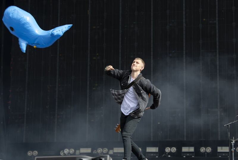 Nathan Evans throws an inflatable whale into the crowd whilst performing at the TRNSMT Festival at Glasgow Green in Glasgow. Picture date: Saturday September 11, 2021