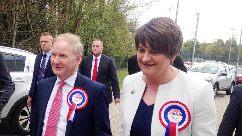 DUP leader Arlene Foster and Lord Morrow arrive at the Omagh Leisure Complex where both were deemed elected yesterday 