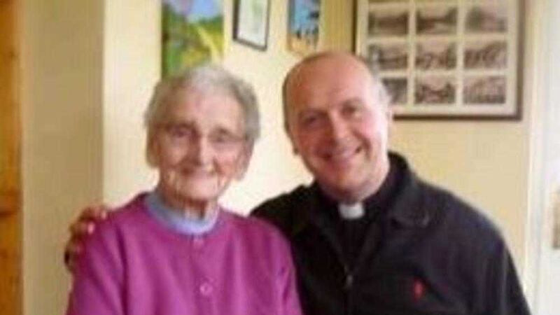 Nora Canavan with parish priest Fr Conor Cunningham 