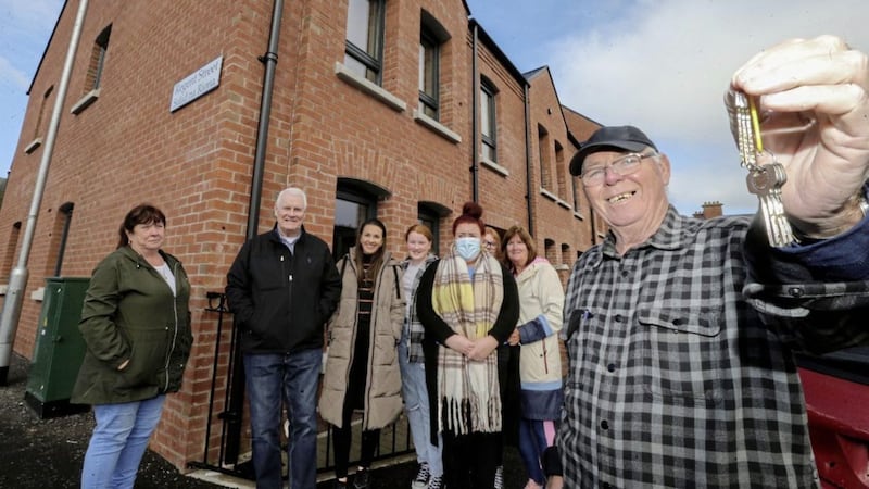 Residents in the Carrick Hill area of north Belfast received the keys to their new homes yesterday 