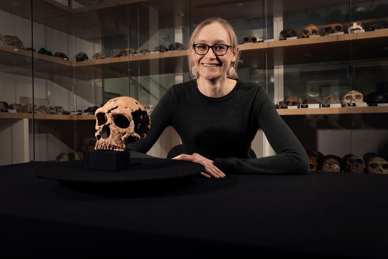 Dr Emma Pomeroy with the skull of Shanidar Z.
