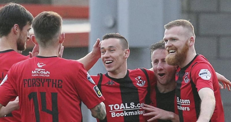 Paul Heatley was unstoppable for Crusaders as he grabbed a hat-trick against Cliftonville 