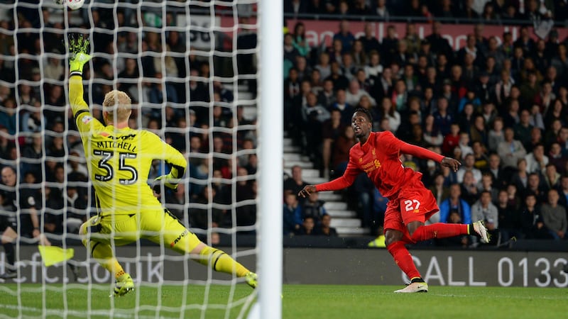 Liverpool's Divock Origi scores the third goal against Derby during Tuesday's EFL Cup third round game at the iPro Stadium<br />Picture by PA&nbsp;