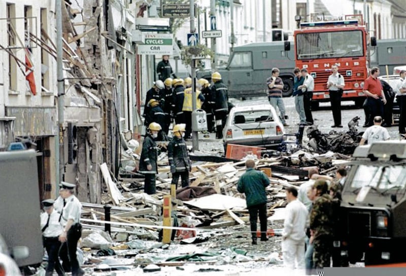 Rescue workers and police search for survivors following following the Omagh bombing. Picture by  Alan Lewis, Photopress