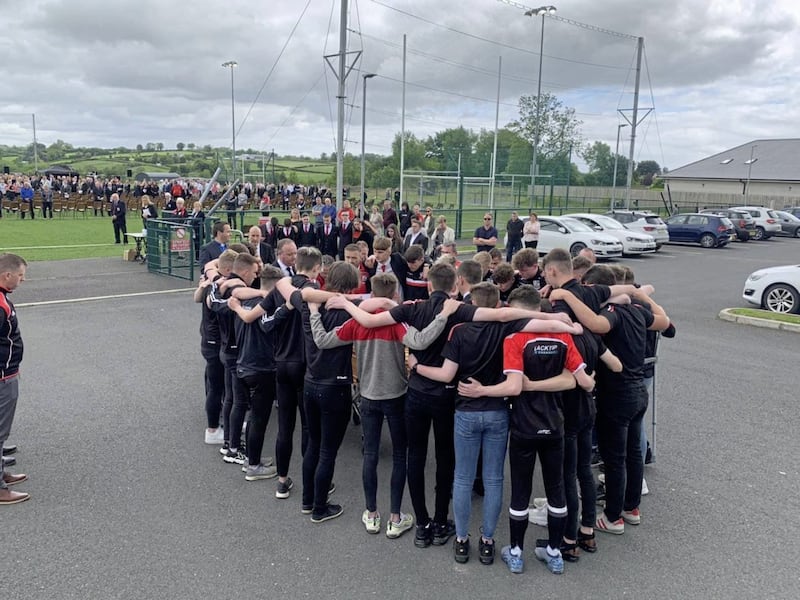 Josh Griggs&#39; Brackaville teammates gather for his funeral at the Owen Rose&#39; GAA grounds last month. 