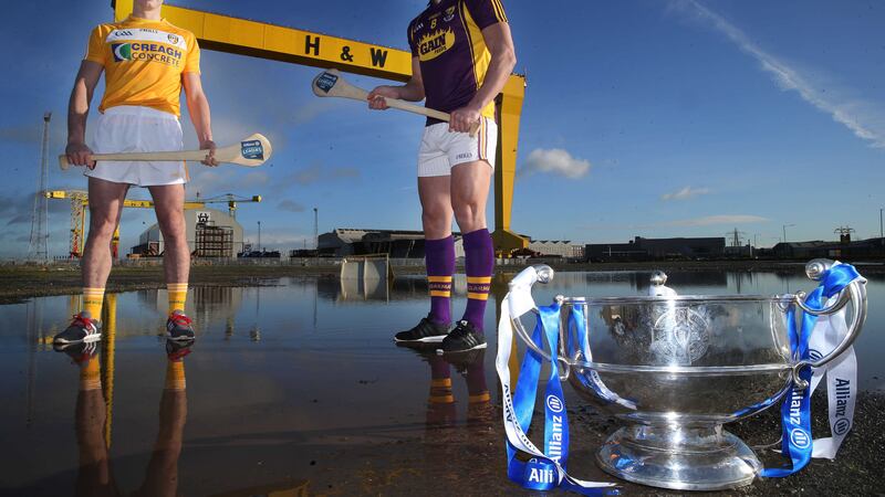 Liam Watson helps launch this year's Allianz National Hurling League along with Wexford's Lee Chin at H&amp;W in Belfast earlier this week <br />Picture by Hugh Russell&nbsp;