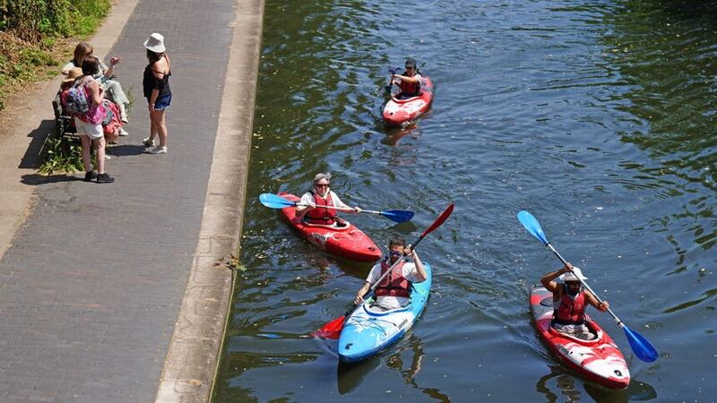 Kayakers on Regent’s Canal (James Manning/PA)