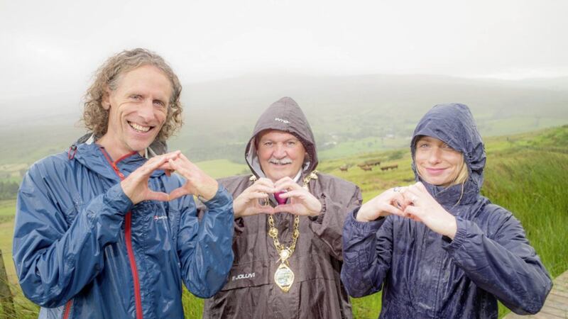 Lawrence McBride of north-west outdoor pursuits company Far and Wild, Derry City and Strabane District Council mayor Maol&iacute;osa McHugh, and the council&#39;s marketing officer Emma Devine. Walkers at next month&#39;s Sperrins and Killeter Walking Festival, hosted by the council, are urged to raise funds for an organ donation charity 