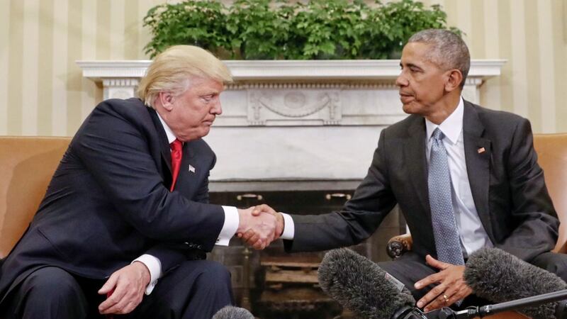 President Barack Obama and president-elect Donald Trump shake hands following their meeting in the Oval Office of the White House in Washington in November 
