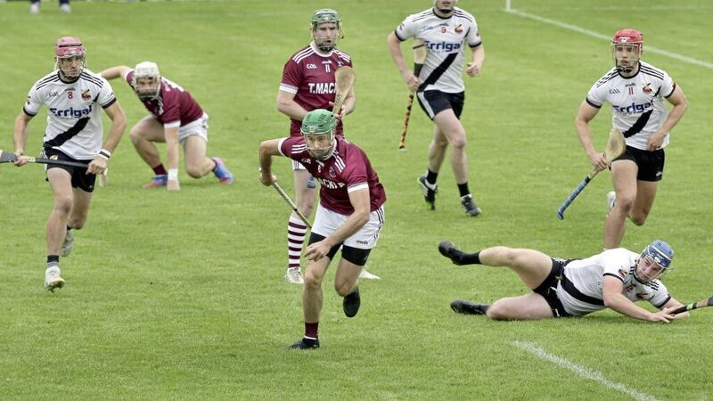 Slaughtneil &#39;s 10 in-a-row winner Chrissy McKaigue on the attack against Kevin Lynch&#39;s n the Derry county final. Picture Margaret McLaughlin. 