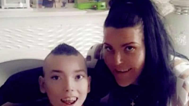 North Belfast mother Aisling Campbell pictured with her son, Pearse (18), who has an aggressive form of scoliosis 