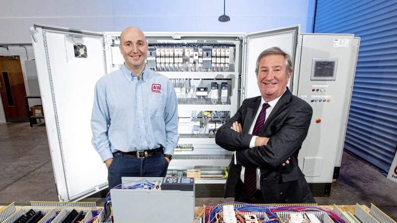 Andrew Willis (left), managing director at AW Control Systems, with Invest NI director Bill Montgomery 