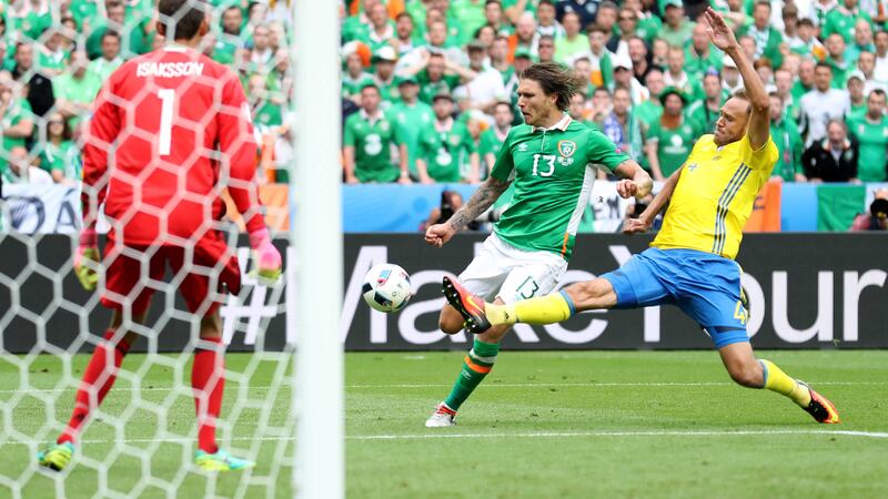 Sweden's Andreas Granqvist (right) intercepts a shot from Republic of Ireland's Jeff Hendrick during the UEFA Euro 2016, Group E match at the Stade de France&nbsp;