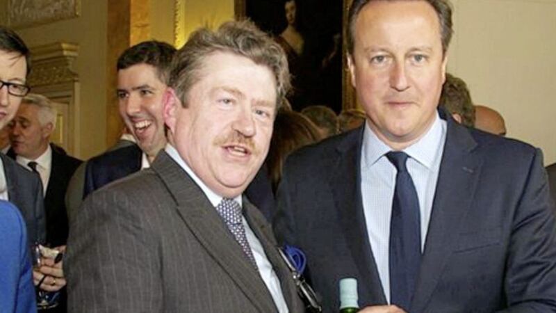 Roger Lomas with former British prime minister David Cameron 