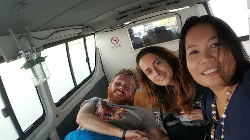 Ben Whiteside and his girlfriend, Anneka Shally with medical staff in Bangkok 