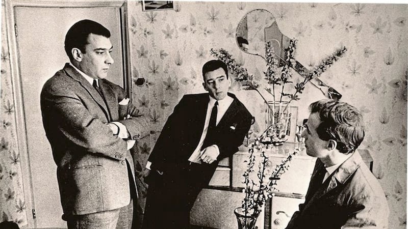 In a picture taken by the late Sunday Times photographer Kelvin Brodie, Cal McCrystal (seated) interviews infamous London criminals Ronnie and Reggie Kray in 1965. 