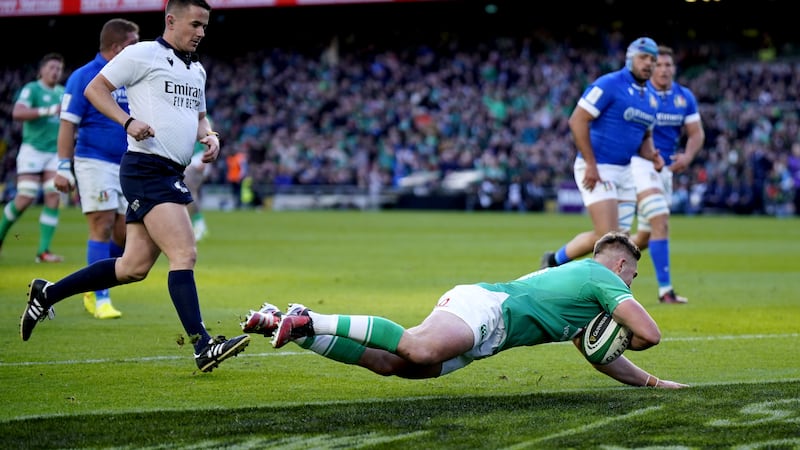 Jack Crowley scores Ireland’s first try of the game