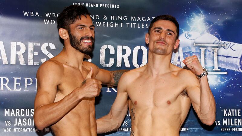 Anthony Crolla (right) and Jorge Linares were all smiles at today's weigh-in, but all-out war is expected when they meet at the Manchester Arena tomorrow night