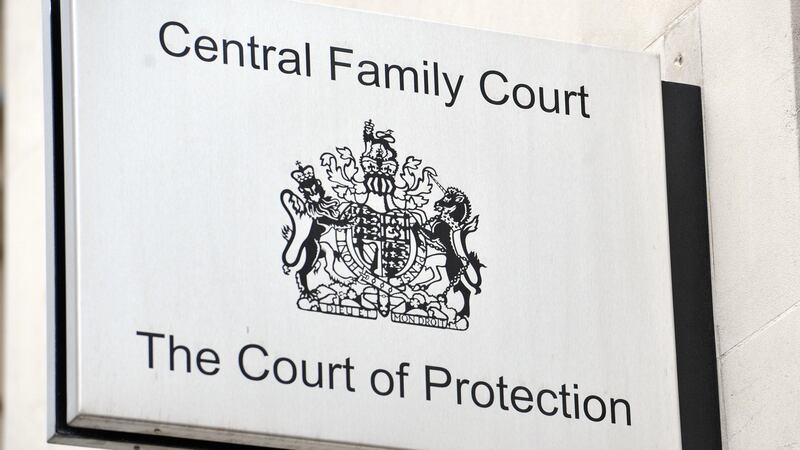 A a sign outside a Court of Protection building in London. Healthcare bosses have accused the parents and grandmother of a woman who suffers from a rare degenerative neurological condition of “tampering” with medical equipment. PA/Nick Ansell