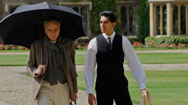 GH Hardy (Jeremy Irons) and Srinivasa Ramanujan (Dev Patel) compare mathematical methods in The Man Who Knew Infinity 