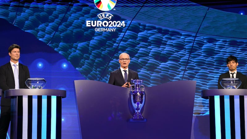 UEFA deputy general secretary Giorgio Marchetti, centre, had to address an unscheduled interruption to the Euro 2024 draw (Adam Davy/PA)