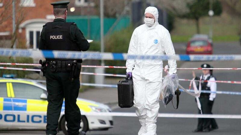 Police and forensic officers at the scene of a shooting in south Belfast where a man in 20&#39;s was shot dead Picture Mal McCann.. 