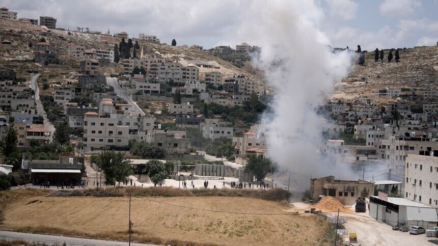 Smoke rises during fighting between Israeli forces and Palestinian militants in the West Bank city of Jenin (AP)
