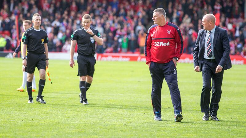 &nbsp;Rangers manager Mark Warburton (right) and goalkeeping coach Jim Stewart (second right) confront match referee John Beaton at the final whistle. Picture by PA