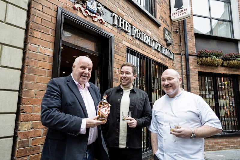 L-R: Willie Jack, Ronan Collins and Niall McKenna outside The Friend At Hand in Hill Street, Belfast. 