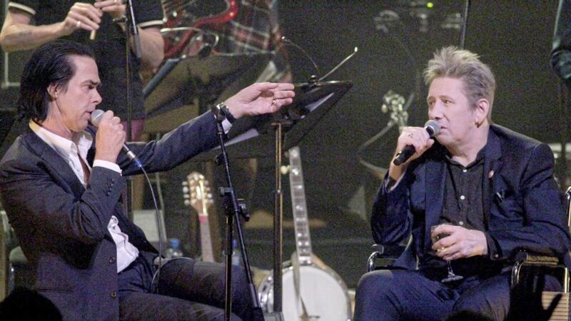 Australian musician and singer Nick Cave and Shane MacGowan perform together &ndash; they sang Pogues&#39; classic Summer In Siam &ndash; on Monday night 