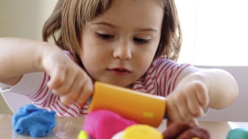 At around age two children often like to learn through doing 