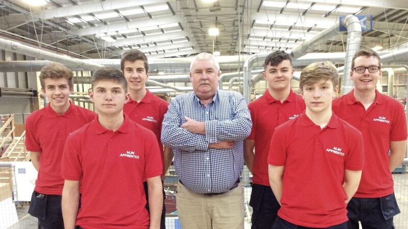 MJM Group apprentices Niall Casey, Marco Gilbert, Scott Dale, Brendan Devlin, Adam Harte and Philip Newell pictured with apprentice programme manager, John Fisher (centre) 