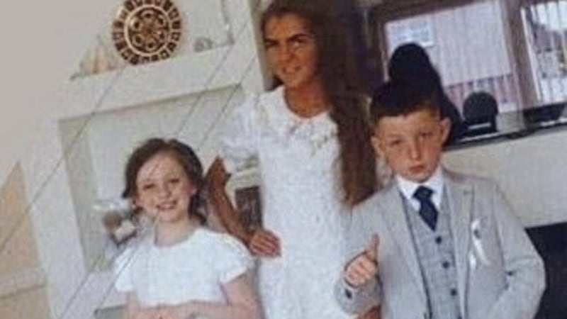 Lisa Cash (18) and her younger brother and sister, twins Christy and Chelsea Cawley (8)