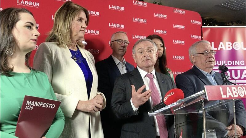 Labour leader, Brendan Howlin, behind the podium at the launch of his party&#39;s general election manifesto with colleagues, including former T&aacute;naiste Joan Burton, second from left, at Iveagh Garden Hotel in Dublin Picture by Cate McCurry/PA 