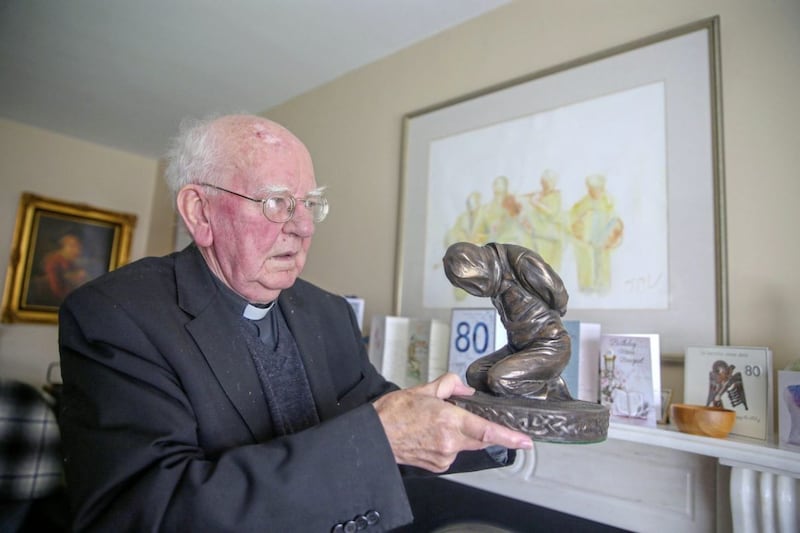 Monsignor Raymond Murray with a statue of a &#39;hooded man&#39;. Picture by Mal McCann 