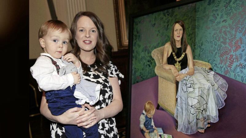 Former Belfast lord mayor, Alliance councillor Nuala McAllister, with her son Finn at the unveiling of her official portrait. Picture by Philip Walsh 