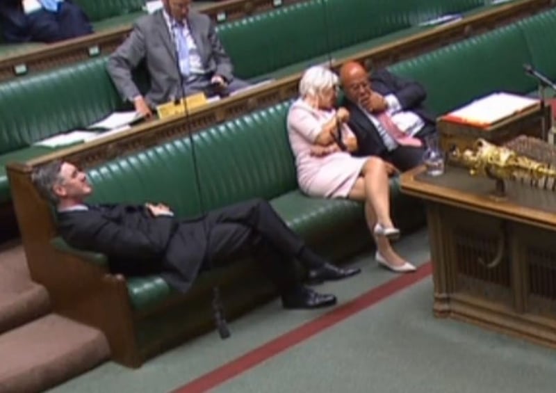 Leader of the House of Commons Jacob Rees-Mogg reclining on his seat in the House of Commons London