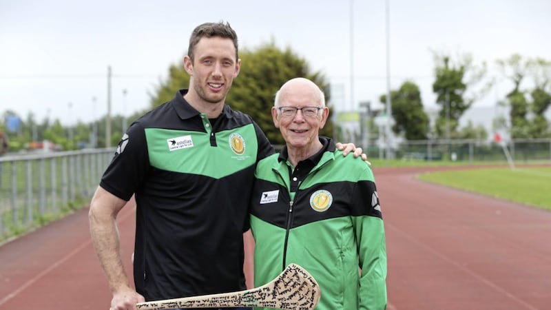 John McAleer from Jordanstown, Co Antrim, the most senior member of the Irish team heading to the World Transplant Games, gets some support from Kilkenny Hurling All Star Michael Fennelly 