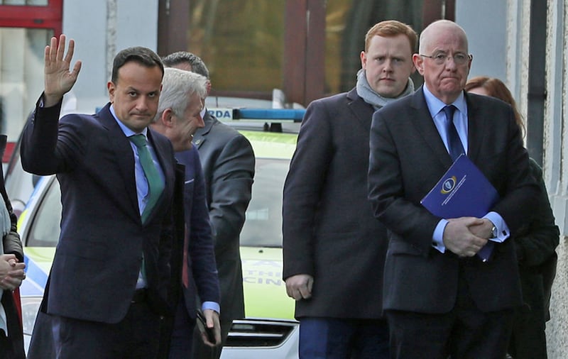 Taoiseach Leo Vradkar and Justice Minister Charlie Flanagan (right) arrive at Drogheda Garda Station in Co Louth. The taoiseach condemned the murder of Keane Mulready Woods as &quot;grotesque and gruesome&quot; and said the entire country is shocked by it, vowing to help gardai bring to justice those behind the murder of the teenager whose remains were found in Dublin. Picture by Brian Lawless/PA Wire&nbsp;