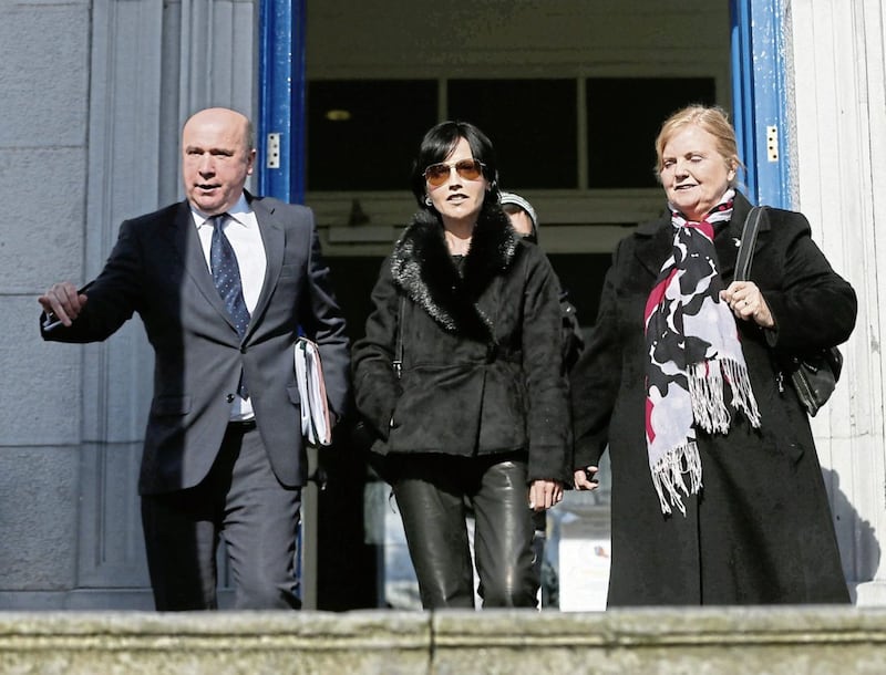 Dolores O&#39;Riordan leaves court in Ennis Co Clare with her mother Eileen last year after she was fined over an air-rage incident 