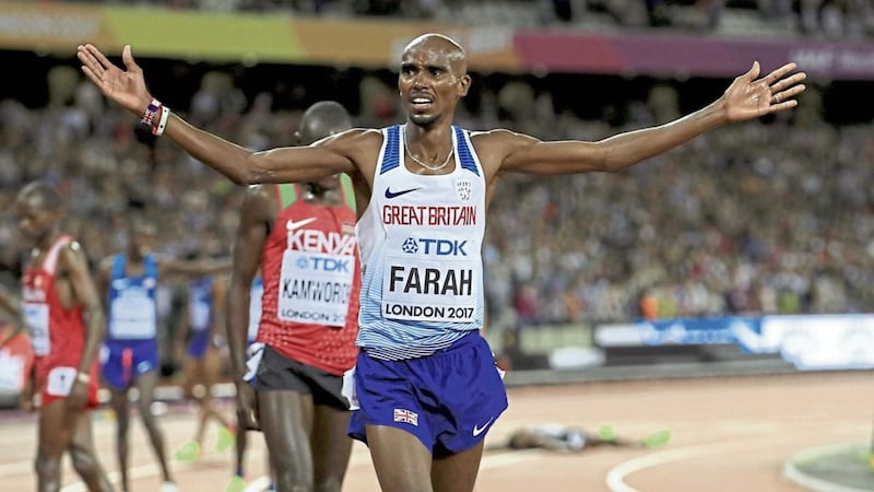 Great Britain&#39;s Mo Farah celebrates winning the men&#39;s 10,000m final during day one of the 2017 IAAF World Championships at the London Stadium 