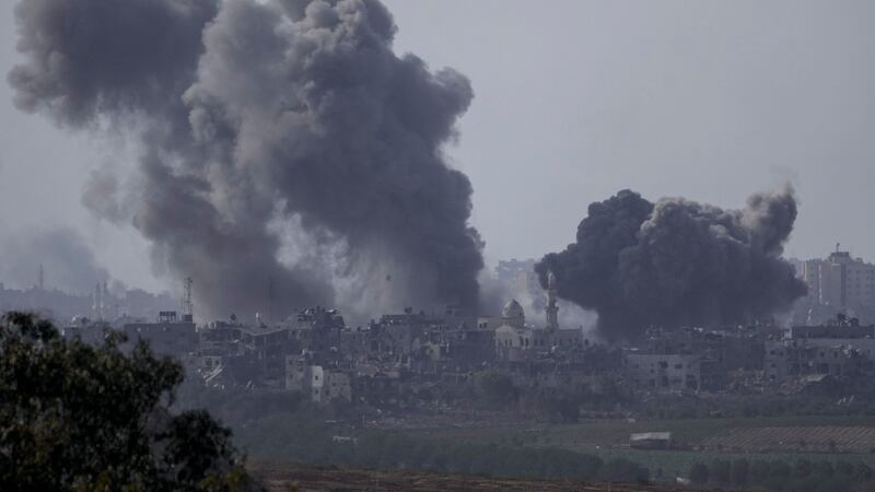 Smoke rises following an Israeli airstrike in the Gaza Strip (Leo Correa/PA)