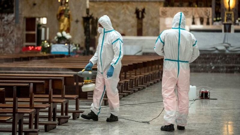 &nbsp;Italian Army and Rome's street cleaning task force personnel sanitize a church to prevent the spread of Covid-19, in Rome, on May 12 2020. Picture by Roberto Monaldo/LaPresse via AP