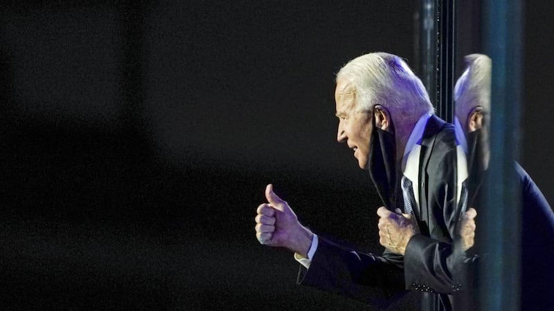 Joe Biden, the US President-elect, gestures to the crowd after making his acceptance speech on Saturday in Wilmington, Delaware. Mr Biden is the second Catholic to be elected as US President - John F Kennedy, another Democrat with Irish connections, was the first. Picture by AP Photo/Carolyn Kaster 