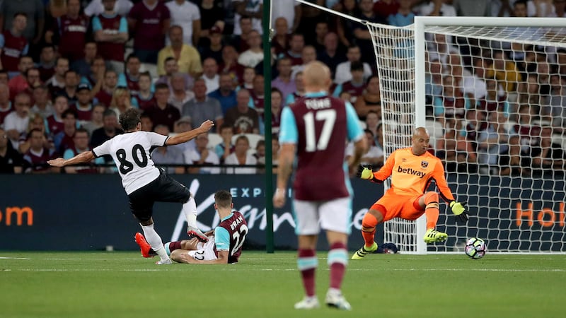Astra Giurgiu's Filipe Teixeira scores the winner past West Ham United goalkeeper Darren Randolph during Thursday's Uefa Europa League play-off at the London Stadium<br />Picture by PA