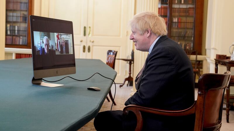 &nbsp;Prime Minister Boris Johnson speaing to veteran Ernie Horsfall, 102, from the cabinet room of 10 Downing Street, London, on the 75th Anniversary of VE Day. Ernie served in the army from 1940 to 1946 as part of the Royal Electrical and Mechanical Engineers (REME)